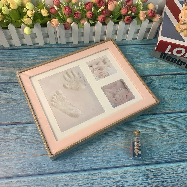 Wooden frame with DIY kit for souvenir footprints in clay