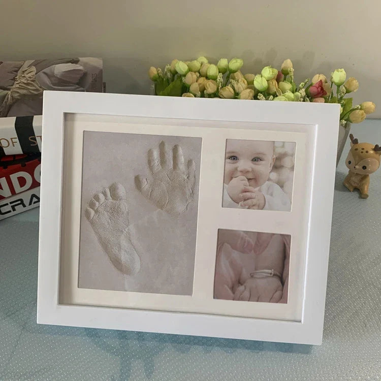 Wooden frame with DIY kit for souvenir footprints in clay