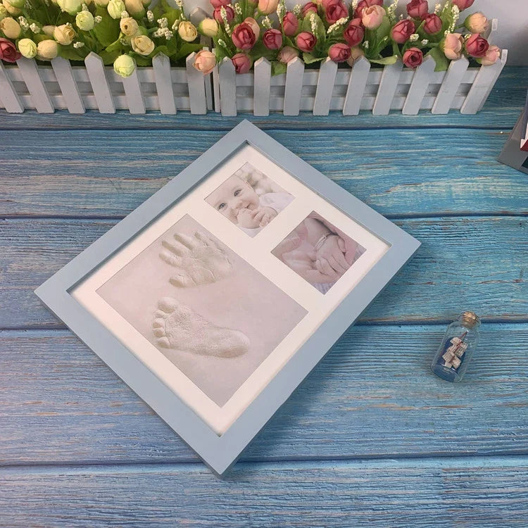 Wooden frame with DIY kit for souvenir footprints in clay